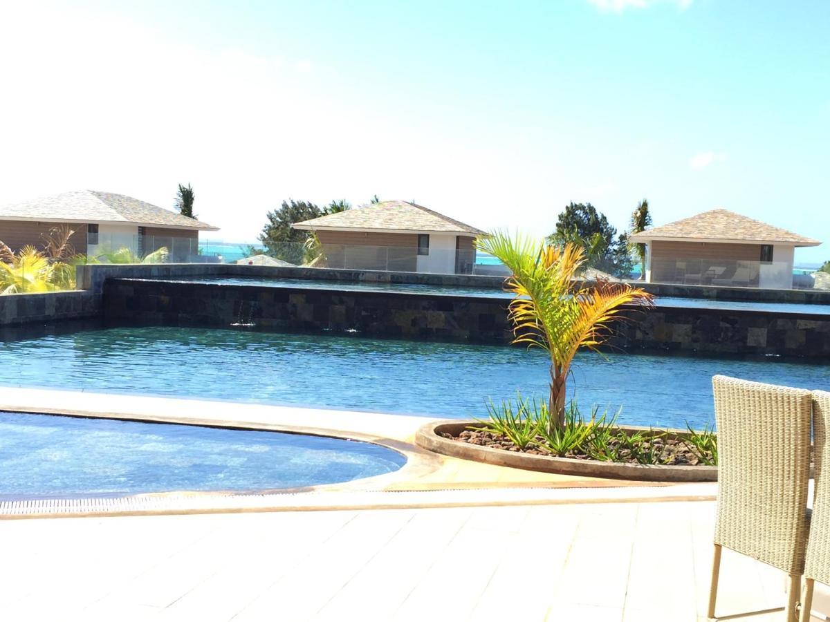 Apartment With 3 Bedrooms In Roches Noires, With Wonderful Sea View, Shared Pool, Terrace Rivière du Rempart 外观 照片